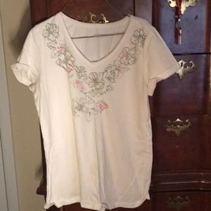 Beautiful white shirt with flower sewed in design